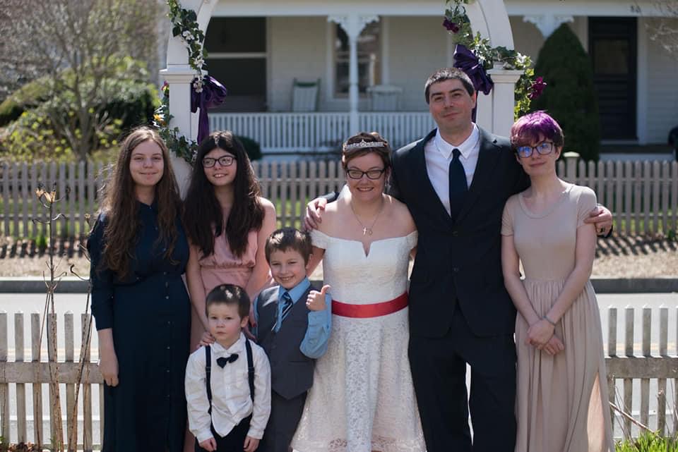 Brandon and his family on their wedding day